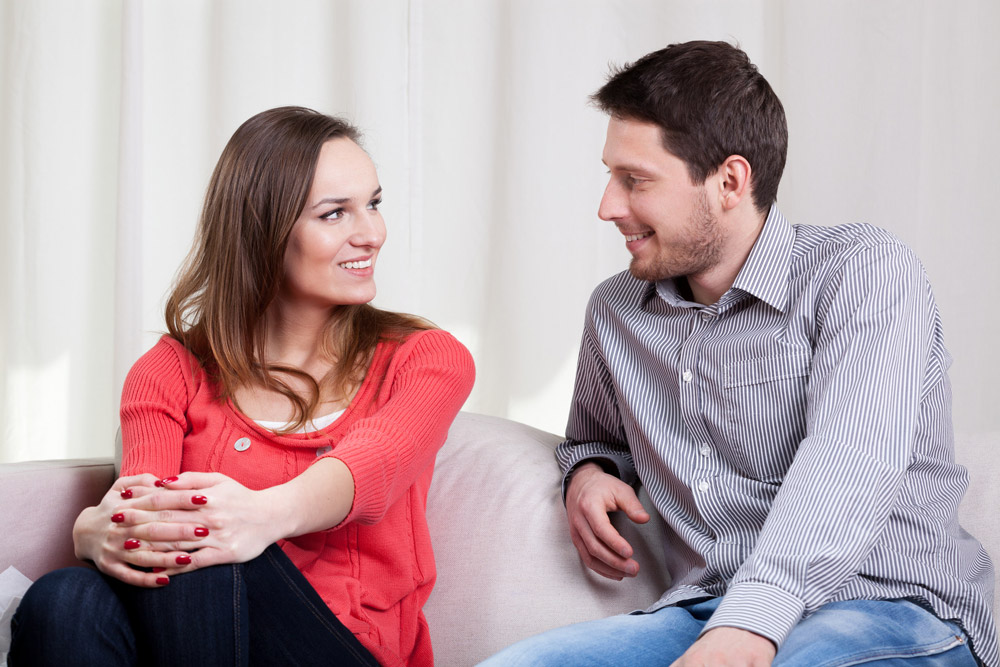 young couple thinking about how to manage their debt